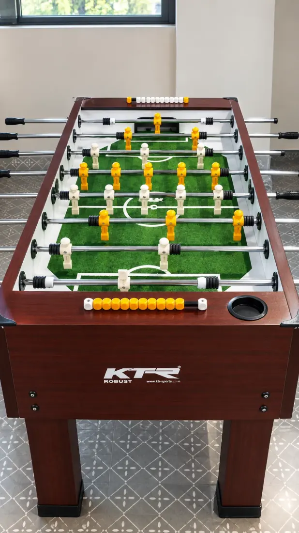 Evolve Studio: full-size foosball table with integrated ball return