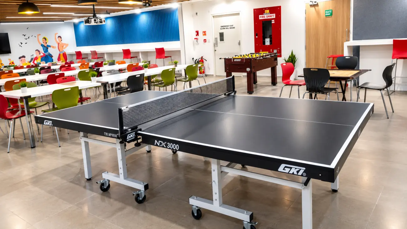 Mitra Academy: table tennis, foosball and carrom in a shared common room